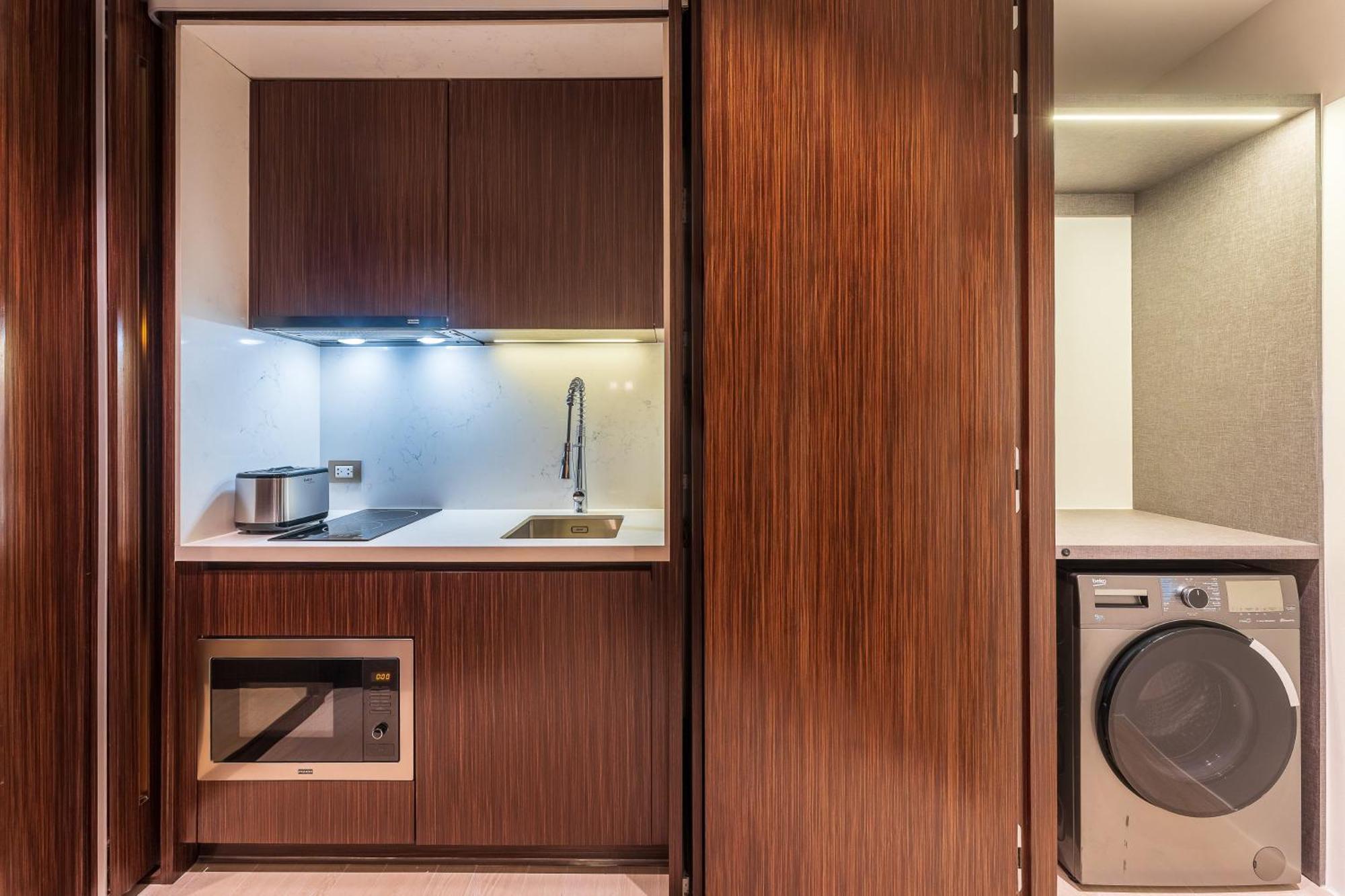 Silq Hotel & Residence, Managed By The Ascott Limited Bangkok Zimmer foto A kitchen in a serviced apartment